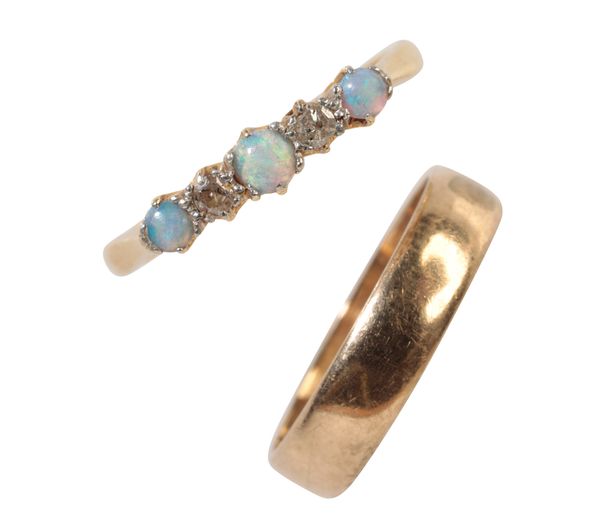 AN OPAL AND DIAMOND RING TOGETHER WITH A GOLD WEDDING BAND