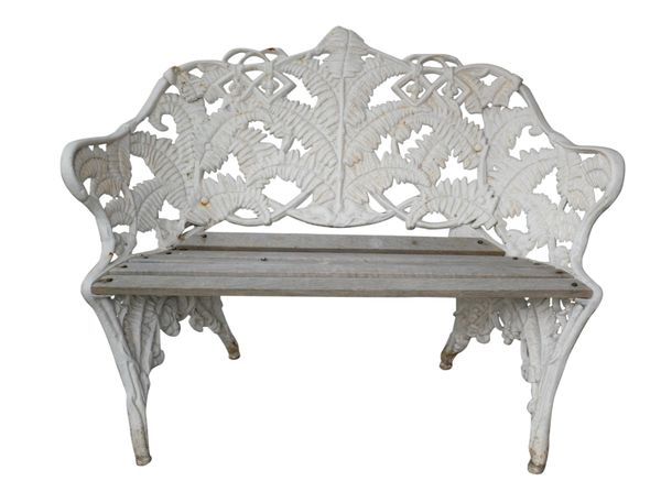 A WHITE-PAINTED CAST-IRON GARDEN BENCH