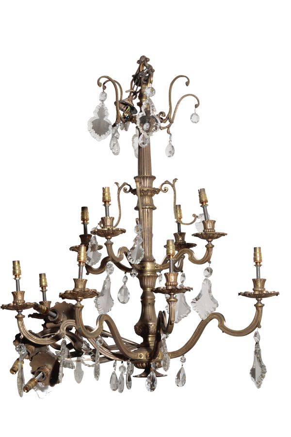 A GILT BRASS TWELVE LIGHT CHANDELIER,