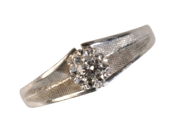 A DIAMOND ILLUSION-SET SINGLE STONE RING