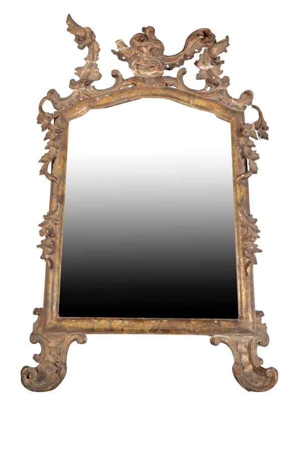 A LOUIS XV CARVED AND GILTWOOD FRAMED WALL MIRROR,