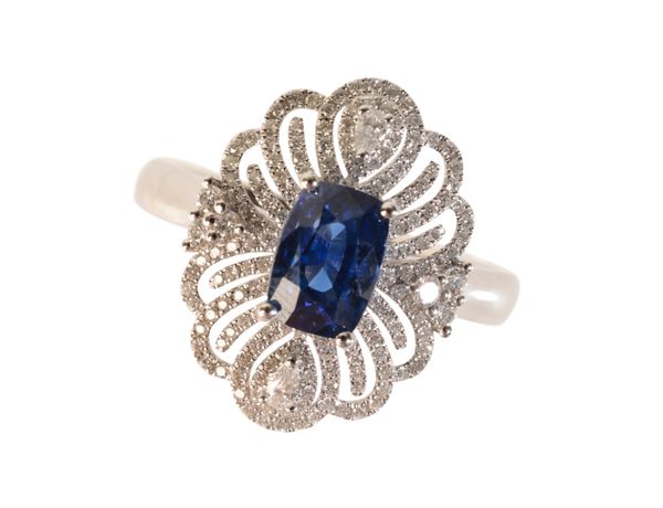 A SAPPHIRE AND DIAMOND RING,