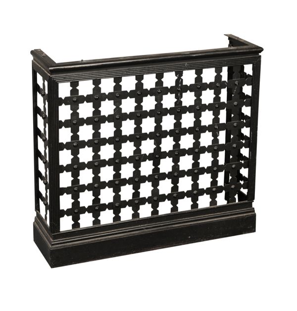 A PAINTED WROUGHT IRON RADIATOR COVER
