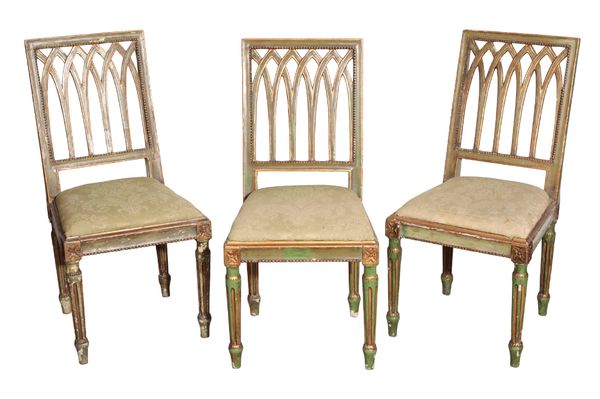 A SET OF SIX REGENCY PAINTED AND PARCEL GILTWOOD SIDE CHAIRS,