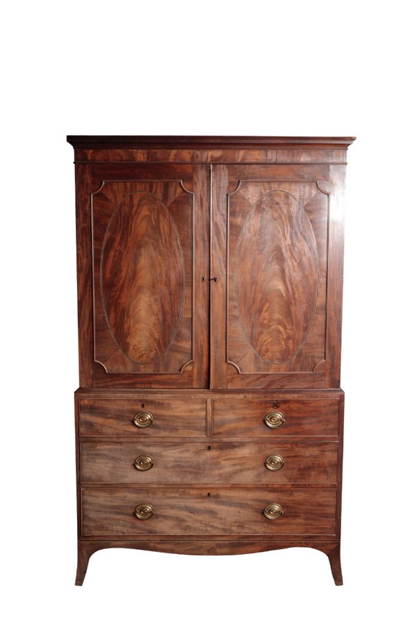 A GEORGE III MAHOGANY LINEN PRESS