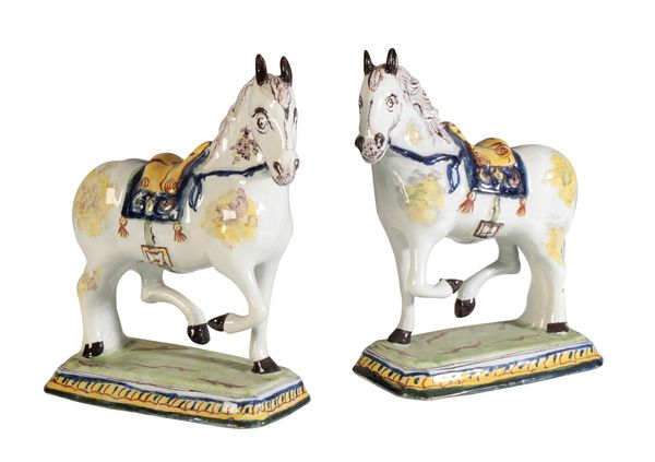 A PAIR OF DELFT POLYCHROME PRANCING HORSES