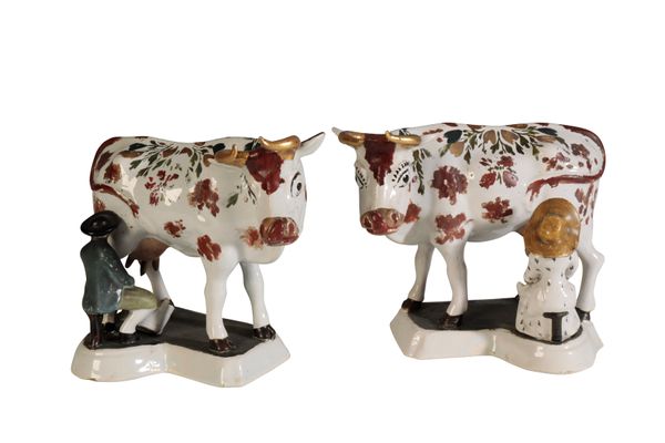 A PAIR OF DELFT POLYCHROME MODELS OF COWS