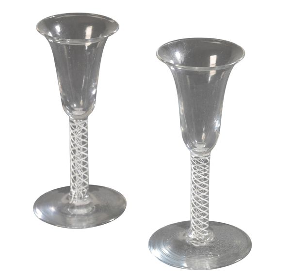 A PAIR OF CABLE AND TWIST WINE GLASSES