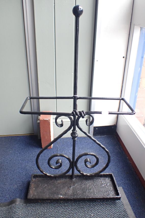 A WROUGHT IRON STICK STAND
