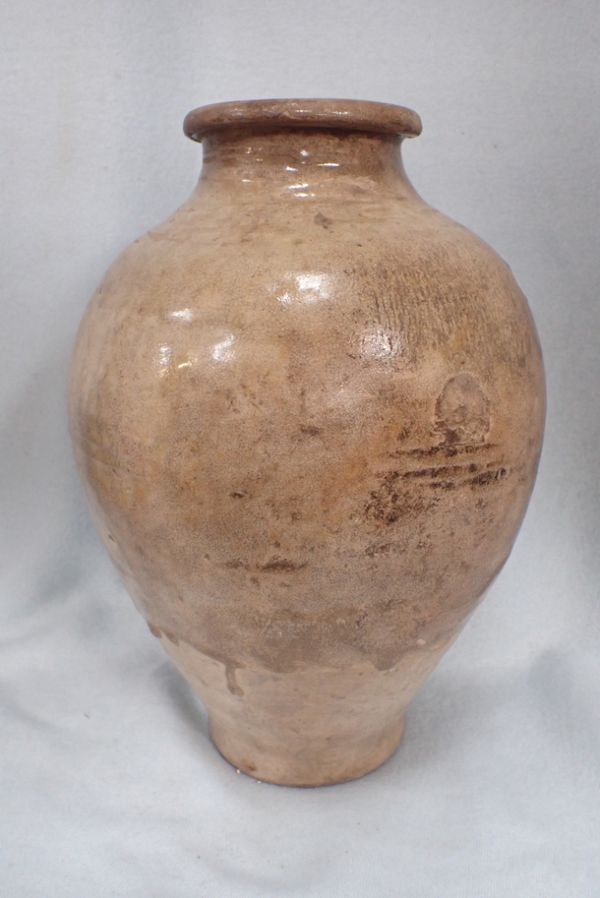 A CHINESE GLAZED BUFF POTTERY VASE