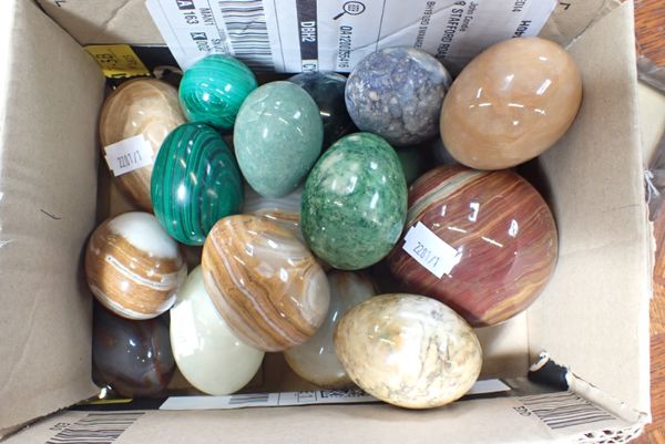 A COLLECTION OF POLISHED MARBLE AND STONE EGGS