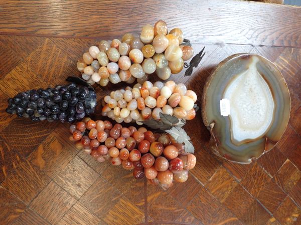 FOUR BUNCHES OF POLISHED STONE GRAPES