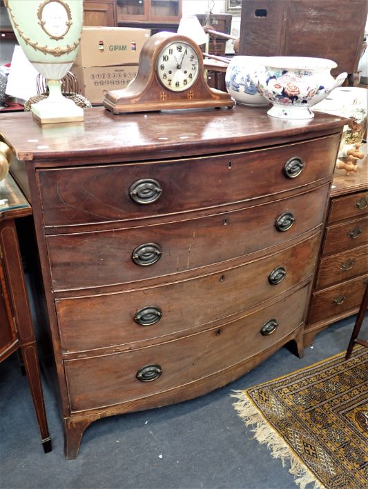 A 19TH CENTURY MAHOGANY BOW-FRONTED CHEST OF DRAWERS