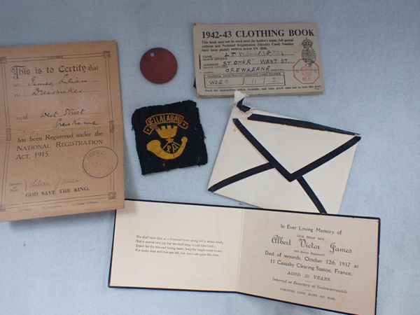 A WWI NATIONAL REGISTRATION CARD, A TAG,WWII RATION BOOK