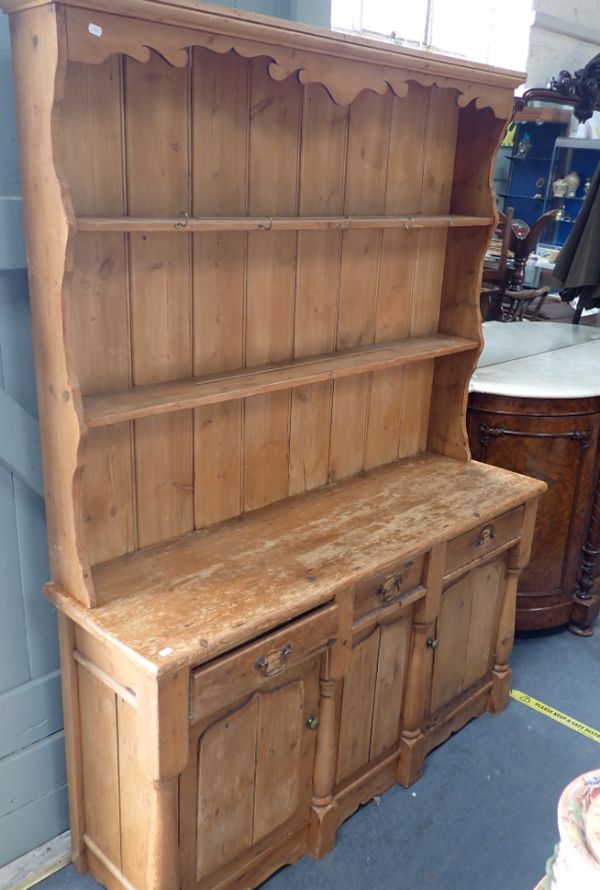 A 19TH CENTURY STRIPPED PINE DRESSER