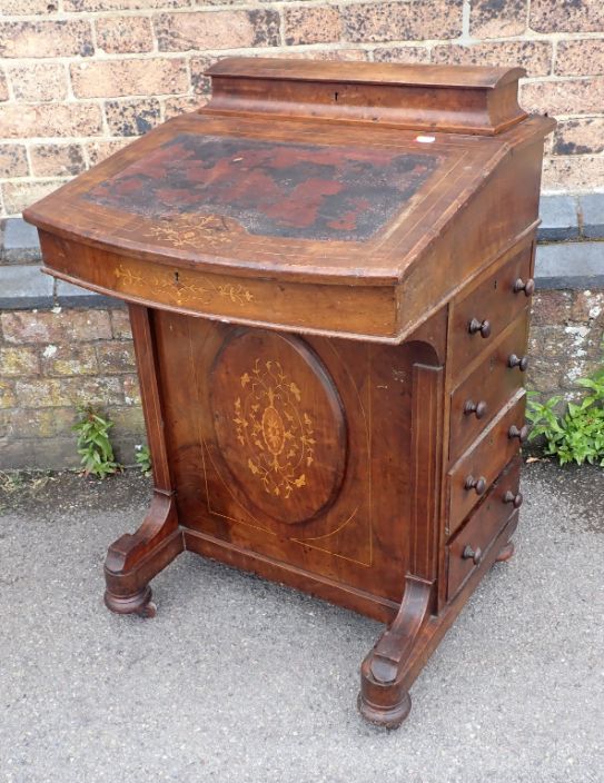 A VICTORIAN WALNUT DAVENPORT