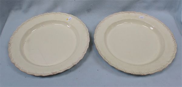 A PAIR OF 18TH CENTURY CREAMWARE CHARGERS