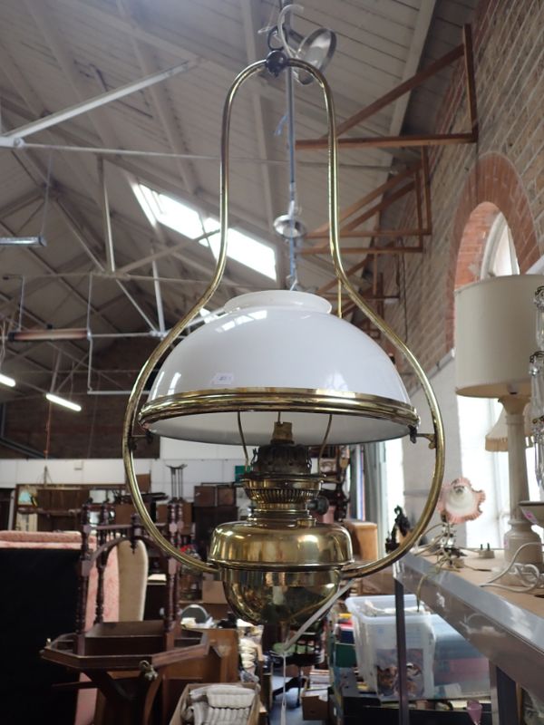 A VICTORIAN HANGING 'HARP' OIL LAMP