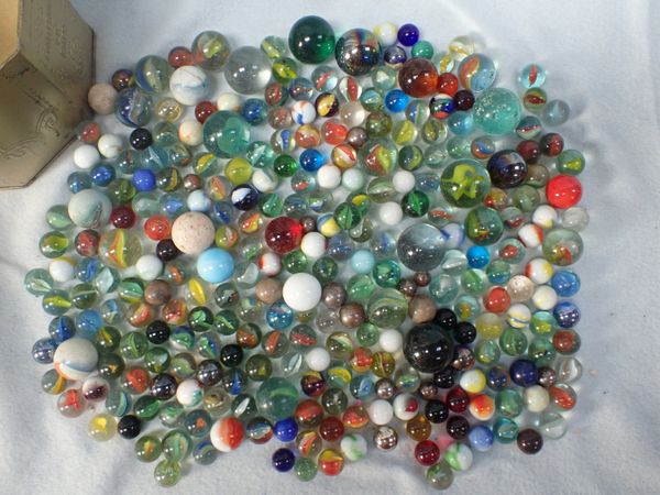 A TIN OF MARBLES