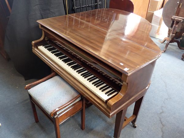 A NIENDORF BABY GRAND PIANO