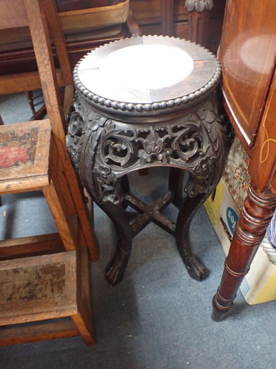 AN EARLY 20TH CENTURY CHINESE HARDWOOD STAND