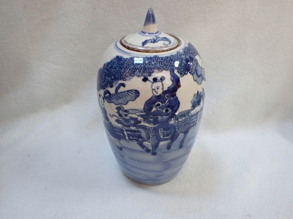 A CHINESE BLUE AND WHITE JAR AND COVER