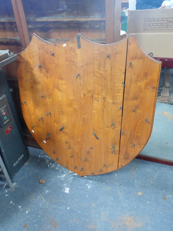 A LARGE OAK SHIELD