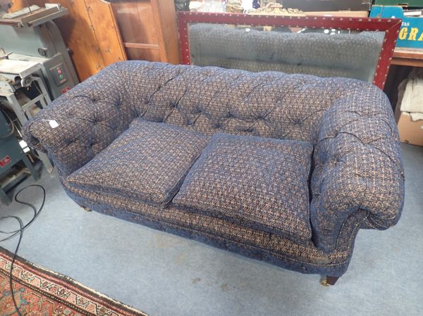 A VICTORIAN CHESTERFIELD, ON  SQUARE TAPERED LEGS