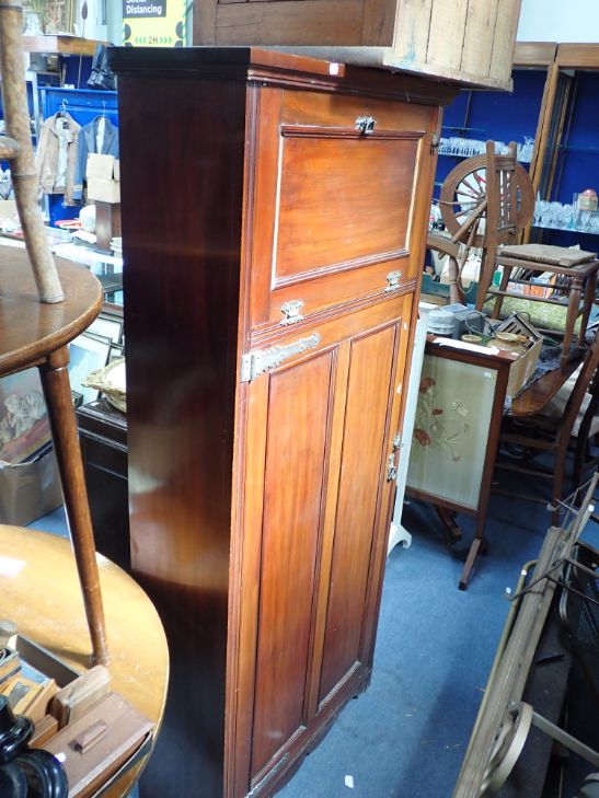 AN EDWARDIAN MAHOGANY HALL CUPBOARD