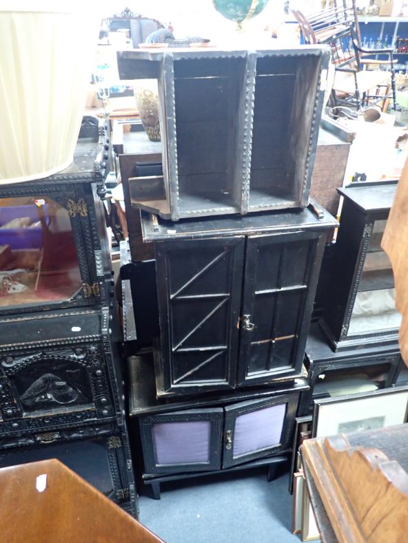 A LATE 19TH CENTURY "QUAINT" AMATEUR DESIGN EBONISED SIDE CABINET