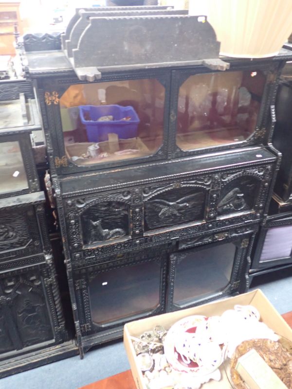 A LATE 19TH CENTURY "QUAINT" AMATEUR DESIGN EBONISED SECRETAIRE BOOKCASE