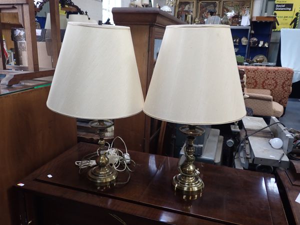 A PAIR OF BRASS TABLE LAMPS