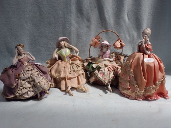 FOUR PIN CUSHION DOLLS