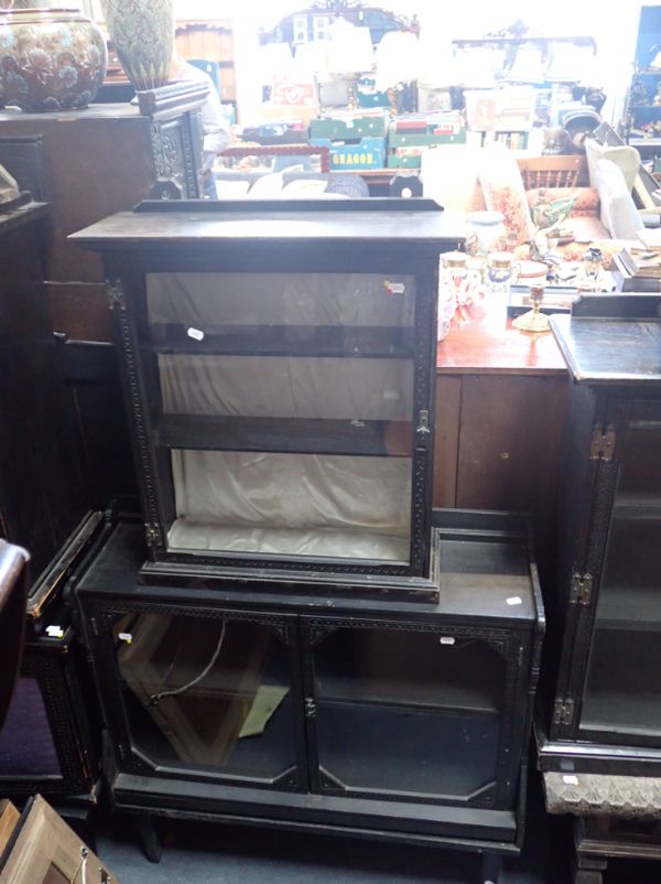 A LATE 19TH CENTURY "QUAINT" AMATEUR DESIGN EBONISED WALL CABINET