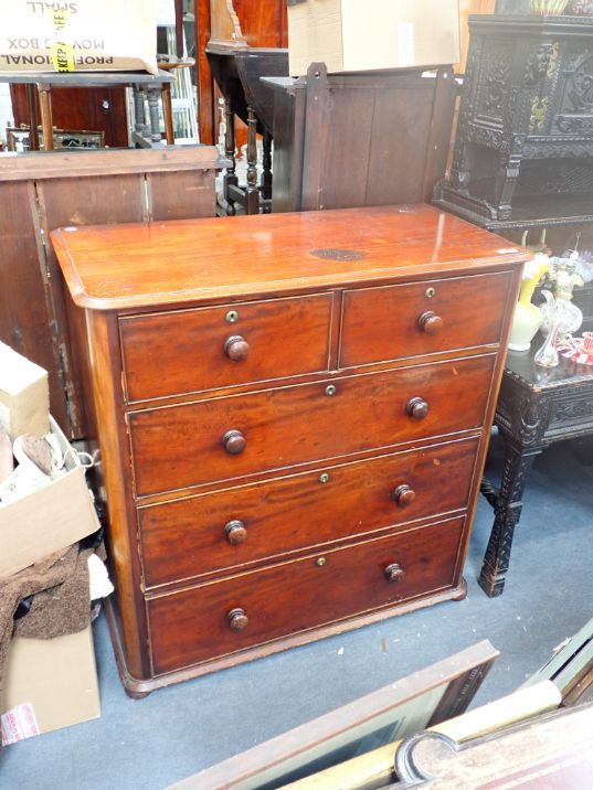 A VICTORIAN MAHOGANY TALL CHEST OF DRAWERS