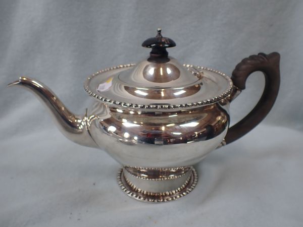 A SILVER TEAPOT, OF BALUSTER FORM