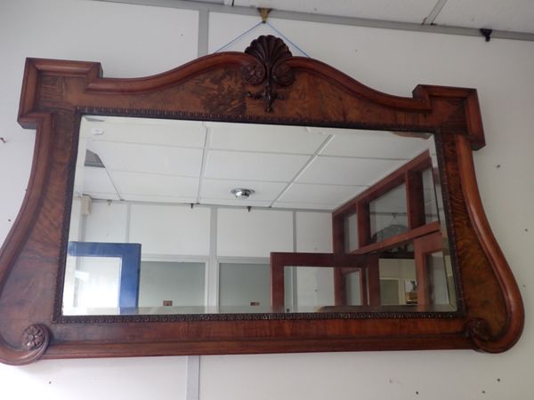 A GEORGE II STYLE WALNUT FRAMED WALL MIRROR