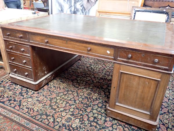 A 19TH CENTURY MAHOGANY PARTNER'S DESK