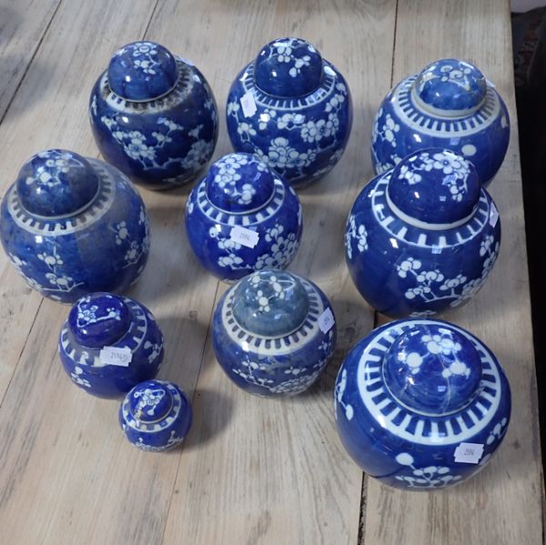 A COLLECTION OF PRUNUS GINGER JARS WITH LIDS