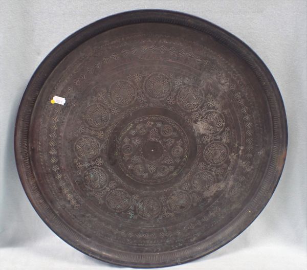 A PERSIAN METAL CIRCULAR TRAY