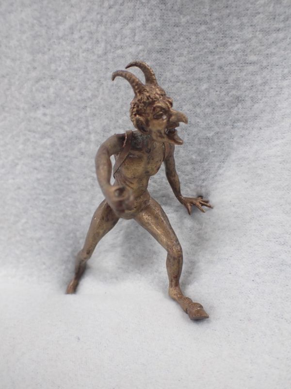 A CAST BRONZE ROMAN STYLE  'DEVIL' FIGURE