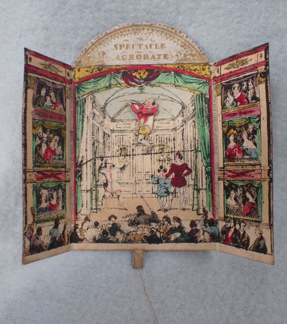 A 19TH CENTURY FOLDING CARD; 'SPECTACLE ACROBATE'