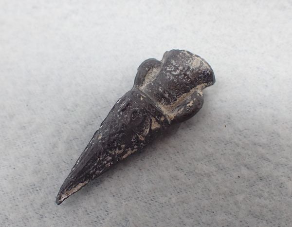 A LEAD 'PILGRIM' AMPULLA, OR FLASK