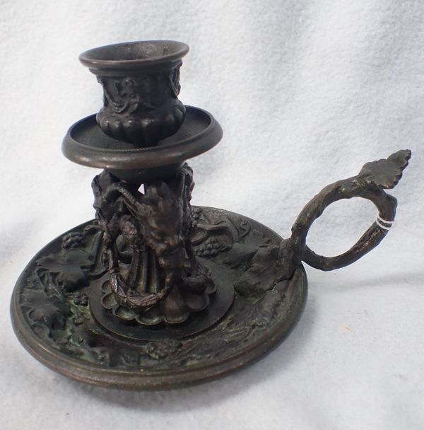 A CAST BRONZE CHAMBERSTICK