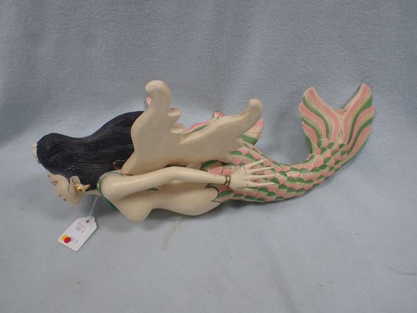 AN ASIAN CARVED AND PAINTED WOOD MERMAID