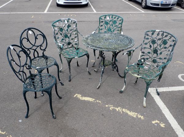 A COLLECTION OF CAST METAL GARDEN FURNITURE