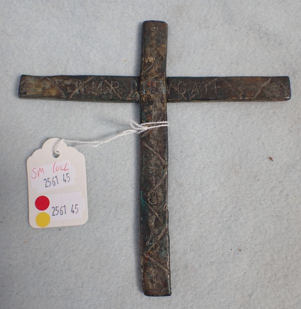 A CRUDELY MADE METAL CROSS 'H.M.P. NEWGATE 1874'