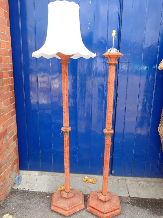 A PAIR OF VELVET-COVERED STANDARD LAMPS