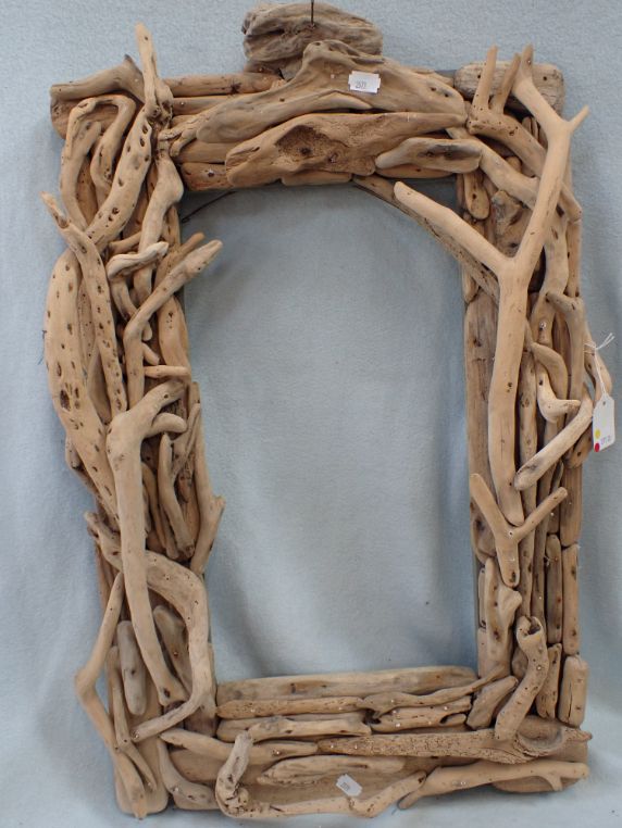 A DRIFTWOOD COVERED FRAME