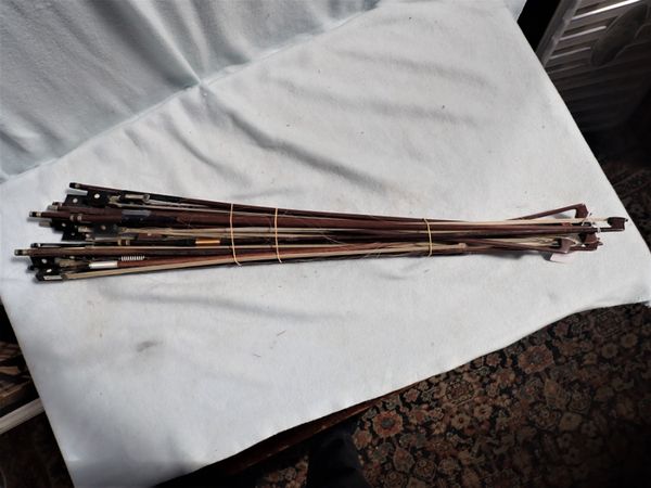 A COLLECTION OF VIOLIN BOWS